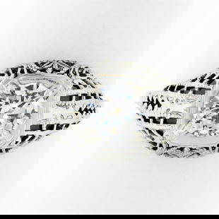 Antique 18k Gold.71 ctw GIA Old Transitional Cut Diamond Filigree Engagement Rin: An art deco solid 18k white gold filigree engagement ring, with 1 GIA Certified old transitional cut natural diamond (I - VS2 ; 0.71ct). The ring is size 7.5, weighs a total of 2.23 grams, and measure