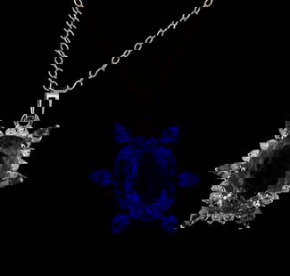 GIA Cert 28.43 ctw Tanzanite and Diamond Pendant With Chain - 14KT White Gold: One electronically tested 14KT white gold lady's combination cast & assembled starburst design pendant & chain 18.0' long, 2mm twisted oval cable link with a lobster claw clasp with a bright polish