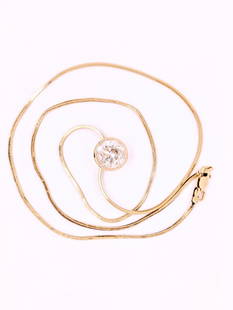 4.00 ctw Diamond Pendant Necklace - 14KT Yellow Gold: This 14KT yellow gold necklace features a bezel-set round brilliant cut diamond weighing approximately 4.00ct, graded I-1 clarity, I color, and Very Good cut. The diamond measures 9.95 x 9.90mm with a