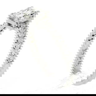 14k White Gold 1.21 ctw GIA Emerald Cut Sideways Diamond Solitaire Engagement Ri: A new solid 14k white gold engagement ring, with 1 GIA graded emerald cut natural diamond (F - VS2 ; 0.91ct), accented with 14 round cut natural diamonds (F/G - VS1/VS2 ; 0.30ctw). The ring is size 7.