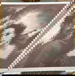 Clark Gable & Joan Crawford by Laszlo Willinger: A sepia tone lithograph from Laszlo Willinger's orig negative # 33/325 signed by Willinger. 22.25 x 22.25"