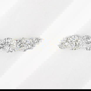 18k White Gold 1.24 ctw Round Ideal Low Profile Diamond 5 Stone Stack Band Ring: A new solid 18k white gold band ring, with 5 round idael cut natrual diamonds (F/G - VS1/VS2 ; 1.24ctw). The ring is size 6.5, weighs a total of 2.77 grams, and measures 4.1mm wide.