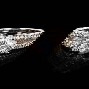 1.01 ctw SI3 CLARITY CENTER Diamond 18K White Gold Ring (1.79 ctw Diamonds): One electronically tested 18KT white gold ladies cast diamond unity ring with a bright polish finish. Condition is new, good workmanship. The featured diamond is supported by diamond set shoulders, co