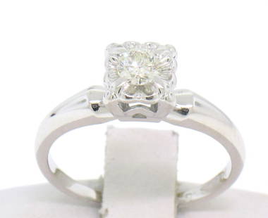 Vintage 14k White Gold 0.18 ctw Round Diamond Illusion Set Solitaire Ring: Vintage 14k White Gold 0.18ctw Round Diamond Illusion Set Solitaire Ring. Please see photos and description for all available information. A vintage solid 14k white gold engagement ring, featuring 1 r