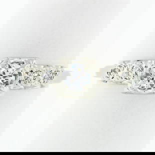 Vintage 14k White Gold 0.37 ctw Round Diamond Solitaire & Accents Engagement Rin: A vintage solid 14k white gold ring with 1 round transitional cut natural diamond (G - VS2; 0.27ct) and 4 round single cut natural diamonds (G/H - VS2; 0.10ctw). The ring is size 6.0, weighs a total o