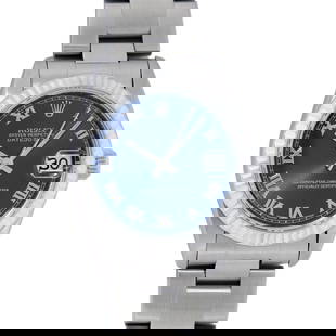 Rolex Ladies Midsize 31MM Factory Blue Roman 18K Gold Fluted Bezel Datejust: One Women's Rolex Midsize Stainless Steel Datejust Polished, Serviced & Electronically Tested, Rolex Stainless Steel Case Case: 31mm, Rolex Stainless Steel Crown, Rolex Bezel: 18K White Gold Fluted Be