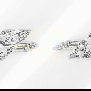 Vintage Platinum 1.50 ctw Round Solitaire w/ Baguette Diamond Engagement Ring: A vintage platinum engagement ring, w/ 1 old transitional cut natural diamond (I - VVS2 ; 1.33ct), 2 straight baguette cut natural diamonds (H/I - VS1/VS2 ; 0.14ctw), and 2 old single cut natural diam