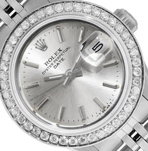 Rolex Ladies Stainless Steel Silver Index Diamond Bezel Date Wristwatch With Rol: One Rolex Ladies Pre Owned Stainless Steel Date Wristwatch Polished Bright with Satin Finish, Serviced & Electronically Tested, Stainless Steel Case: 26mm, Stainless Steel Crown, Custom Bezel: New Sta