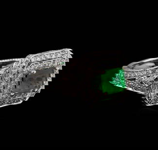14KT White Gold 0.83 ctw Emerald and Diamond Ring: One electronically tested 14KT white gold Ladies combination cast & assembled ring with a bright polish finish. Condition is new. Identified with markings of "14K". Containing: One prong set emerald s
