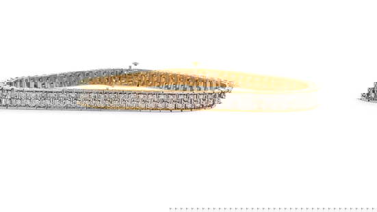 14KT Yellow Gold 5.07 ctw Double Row Diamond Tennis Bracelet: A striking 14KT yellow gold double-row diamond tennis bracelet featuring 122 round brilliant cut diamonds totaling 5.07 carats. Measuring 7 1/4 inches, this elegant bracelet is crafted with a bright p