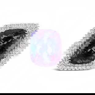 9.29 ctw Tanzanite and 1.05 ctw Diamond Platinum Ring (GIA CERTIFIED): ONE PLATINUM LADY'S CUSTOM MADE DIAMOND and TANZANITE RING . 10.70 GR TW #1 - MAIN CENTER GEMSTONE(S):# IDENTITY: ONE CENTER NATURAL TANZANITE SET IN 4 PRONGS SETTING STYLE CARAT WEIGHT: 9.29 CTS SHAP