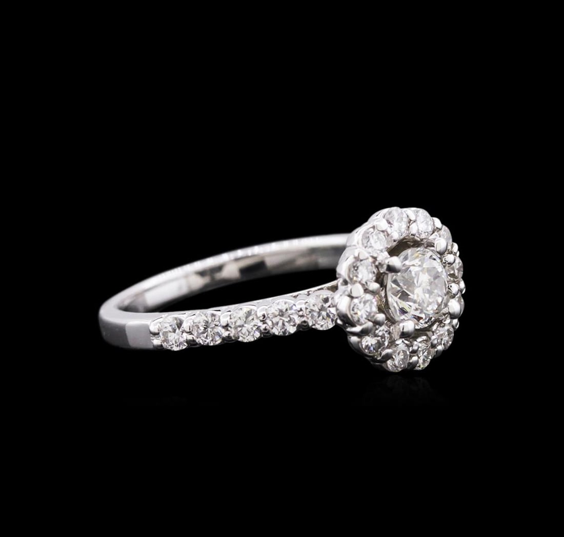 1.28 ctw Diamond Ring - 14KT White Gold: One electronically tested 14KT white gold ladies cast diamond engagement ring with a bright polish finish. Identified with markings of "14K". Condition is new. Containing: One prong set round brillian