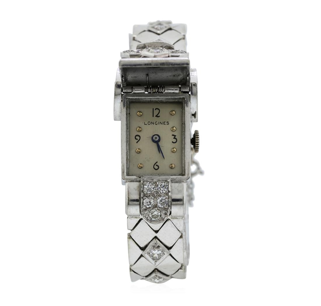 Longines Lady's Bracelet Watch - Platinum and 14KT White Gold: One lady's, hand fabricated Longines retangular shape case bracelet watch electronically tested platinum and 14KT white gold, Crown: pull-out, Crystal: flat glass, Movement: manual wind 17 jewel, Dial