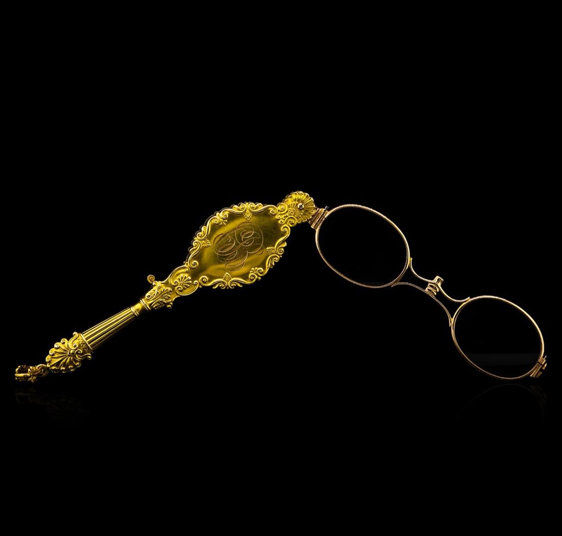 Lorgnette 14KT Yellow Gold Antique Opera Glasses: One 19th century Lorgnette 14KT yellow gold hand assembled antique opera glasses with a bright polish finish. The glasses are in very good condition.