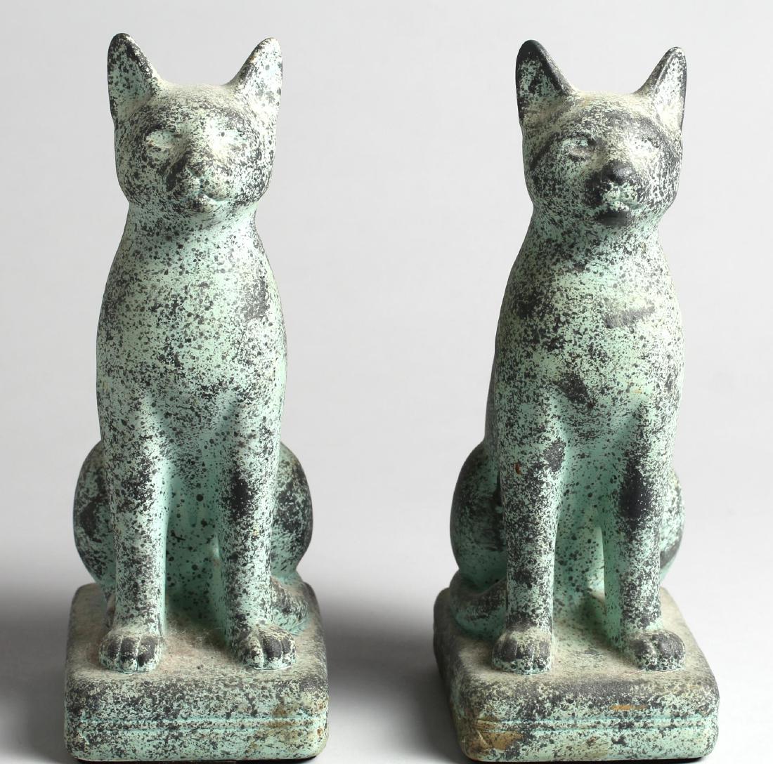 Andrea by Sadek Porcelain Egyptian Cat Figures: Bast or Bastet cat figures, vintage 1960s, from the ancient Egyptian original, patinated to look like antique copper, each with labels to the underside. 8.75" H.