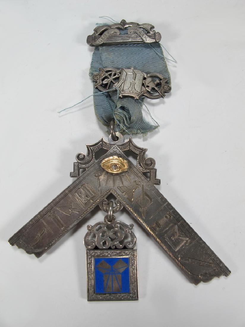 Antique Masonic 900 silver Past Master breast jewel: Antique Past Master breast jewel. The 900 silver square is decorated with etched Masonic working tools and symbols. Pierced No 62 above the 47th problem of Euclid. Pierced Masonic symbols in the brooc