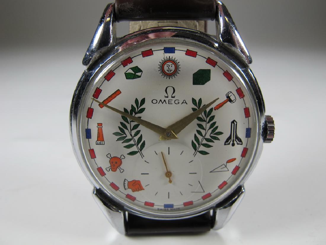 Vintage Omega Masonic menâ€™s wrist watch: Vintage Omega Masonic men"™s wrist watch with Masonic symbols at numerals, stainless steel case #15130. New leather strap. 1 1/2" Diameter. Shipping in USA or International please contact both UPS s