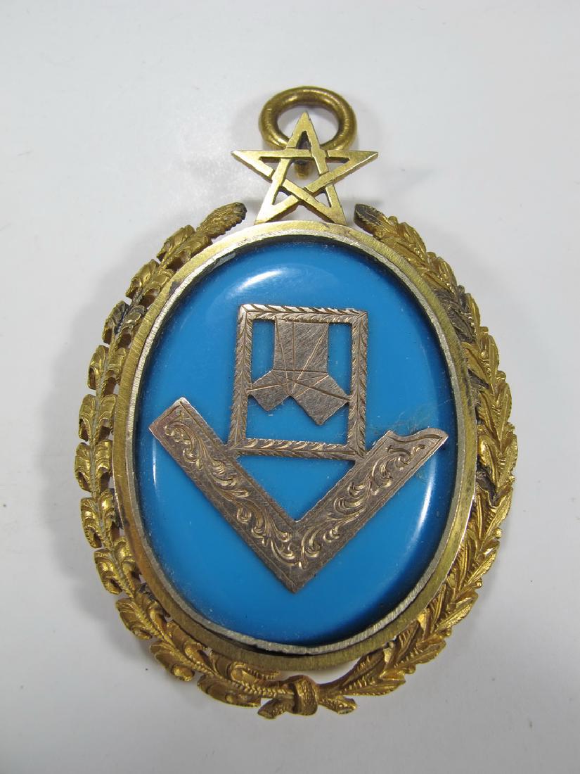 Antique Masonic 8k gold & turquoise jewel: Gold square and 47th Euclid"™s problem in the center of an oval,probably, turquoise. 8K gold back engraved "œP. M. Lodge No. 35 Liverpool". Gold plated Star of David and wreath. Weight: 12.3 grams 