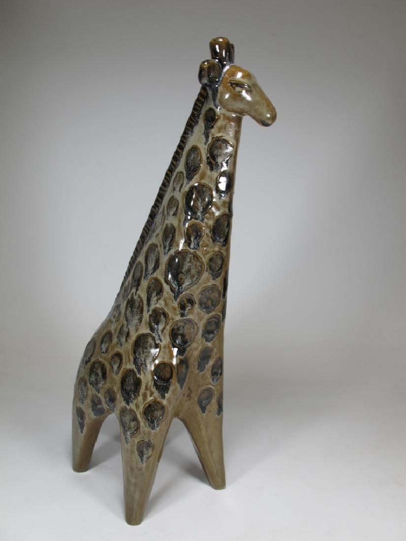 Lisa Larsson, Gustavsberg Swedish Glazed Giraffe: Lisa Larsson, Gustavsberg Swedish Glazed Giraffe, marked. 15" H x 3 7/8" W x 5 3/4" D. Shipping in USA or International please contact both UPS stores for quote: James Lawrence, UPS Store 4356, 954-46