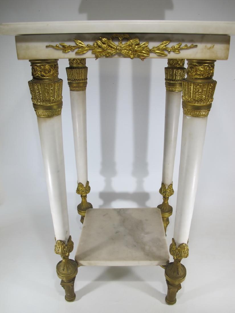 Antique French Empire ormolu carrara marble table: Antique French Empire ormolu carrara marble table. 31 5/8" H x 17 1/4" W x 17 1/4" D. Shipping in USA or International please contact both UPS stores for quote: James Lawrence, UPS Store 4356, 954-463