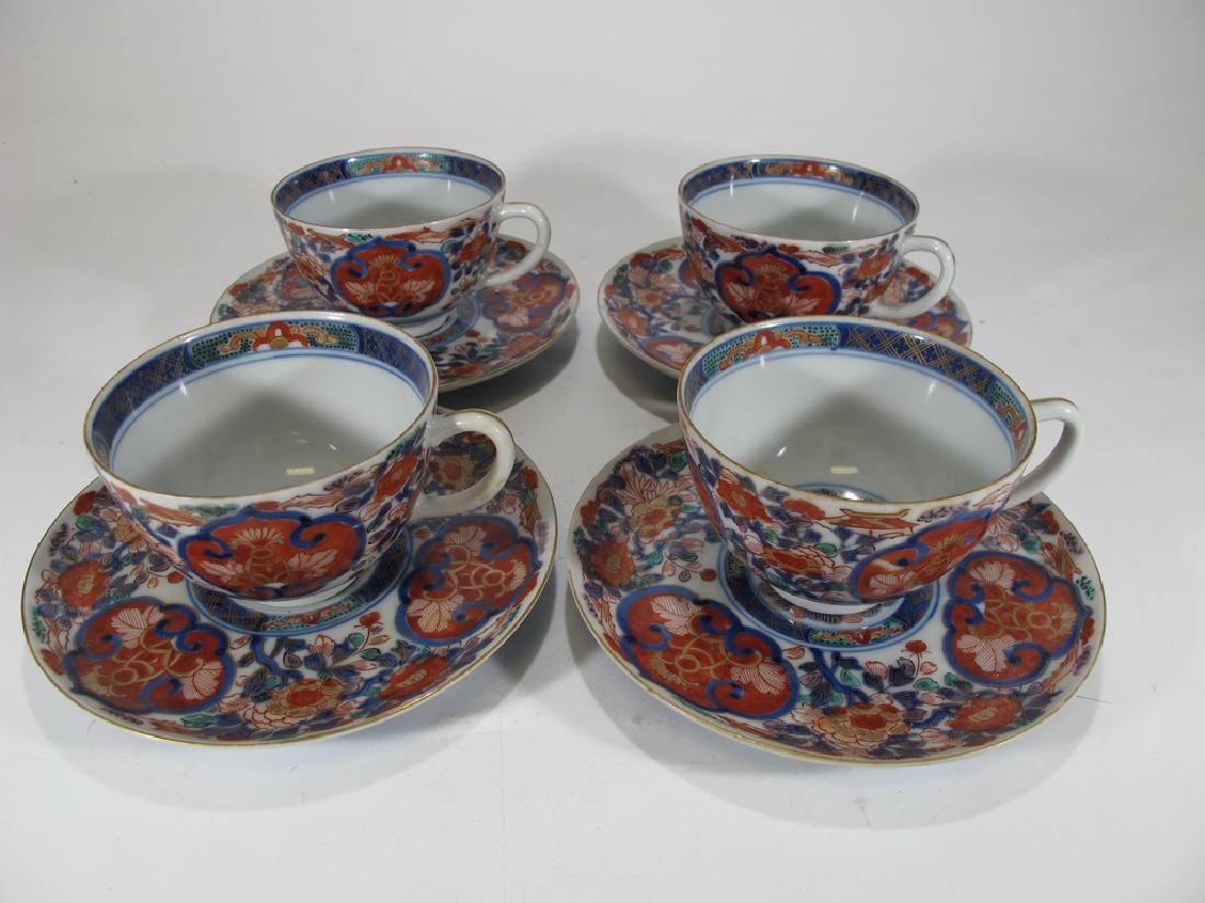 Antique Japanese Imari porcelain set of 4 tea cups: Antique Japanese Imari porcelain set of 4 tea cups. Cup: 2 1/4" H x 3 1/2" W, Plate: 5 7/8" W. Shipping in USA or International please contact both UPS stores for quote: James Lawrence, UPS Store 4356