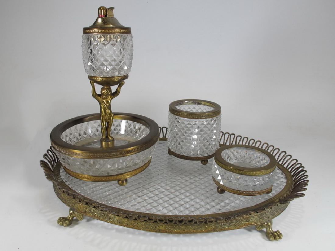Antique bronze & glass desk set: Antique bronze & glass desk set. Tray: 1 3/4 in H x 13 in W x 9 1/2 in D, Lighter: 8 1/4 in H x 5 3/8 in W, Big bowl: 2 7/8 in H x 2 3/4 in W, Small bowl: 1 1/2 in H x 2 3/4 in W. Shipping in USA or I