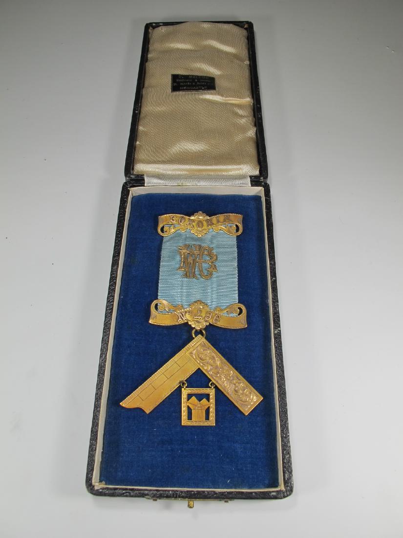 Antique Masonic 11k gold Past Master jewel: Antique Masonic 11k gold Past Master jewel. The top bar reads Boronia in raised gold letters. Pierced initials in the center of the blue ribbon. Raised No. 496 reads in the middle bar. The square is e