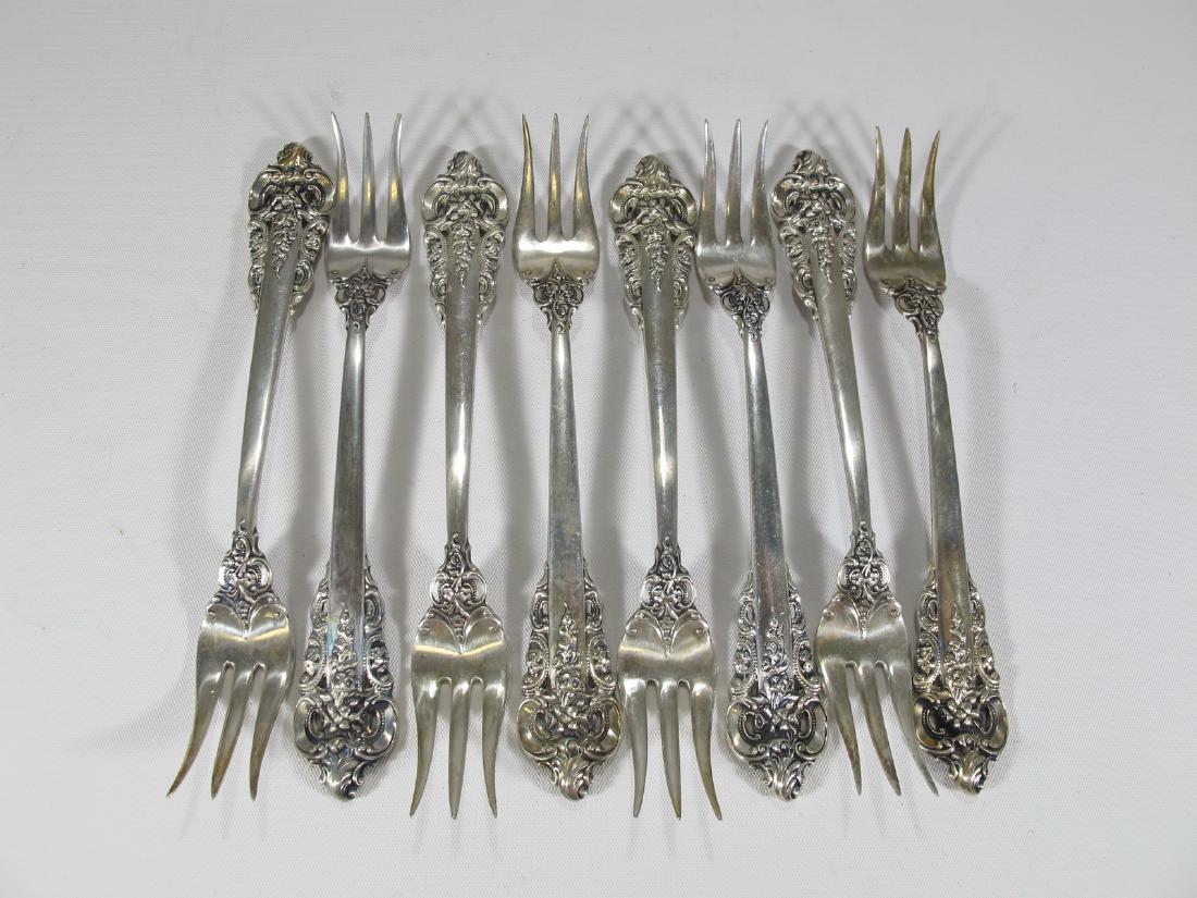 Wallace Grande Baroque Pattern Sterling Silver 8 forks: Wallace Grande Baroque Pattern Sterling Silver 8 forks. 5 3/8 in long. Weight: 193.3 grams (6t oz 4.294788 dwt). Shipping in USA or International please contact both UPS stores for quote: James Lawren