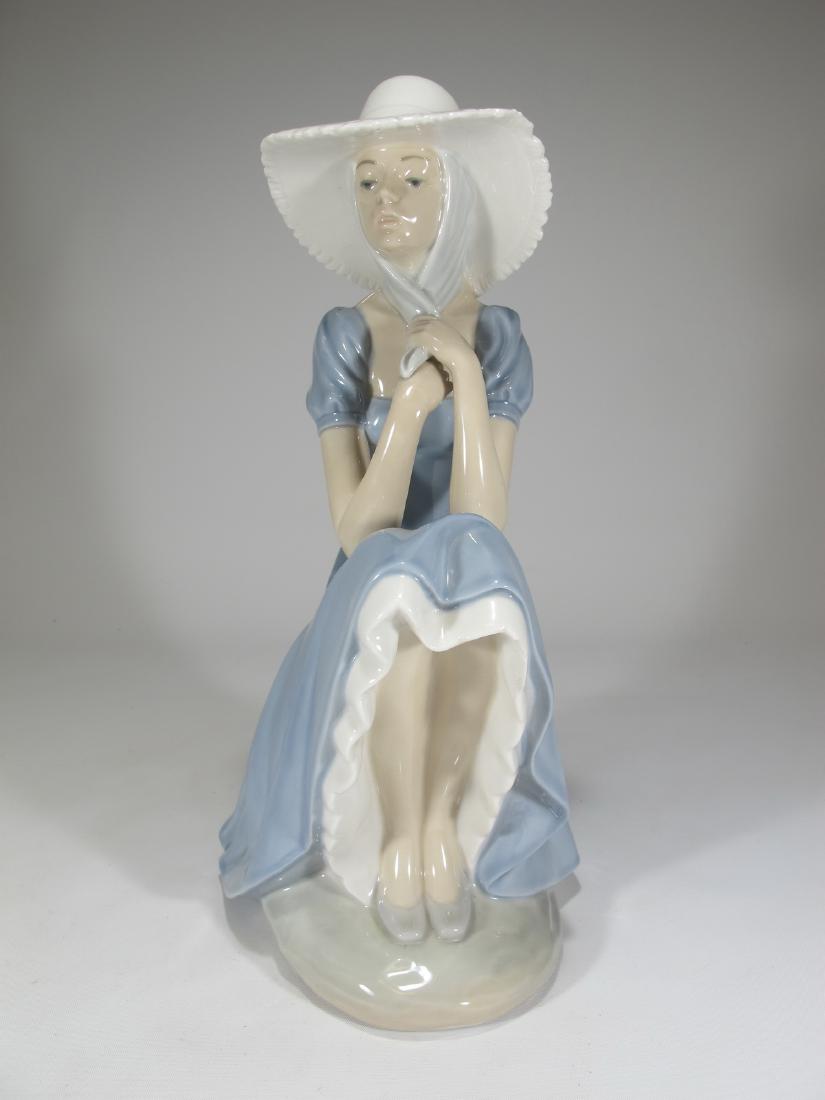 Lladro Nao girl with straw hat sitting porcelain statue (1 of 7)
