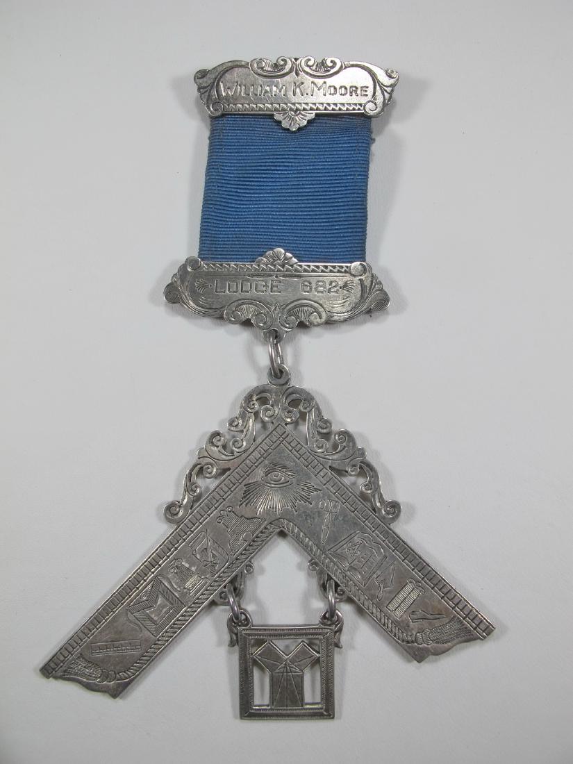 Masonic Sterling Past Master breast jewel: Masonic Sterling Past Master breast jewel set square and 47th problem of Euclid engraved William K. Moore Lodge 682. The square is engraved with Masonic symbols. Dated in the back 1948.. 5 1/8 in h x 