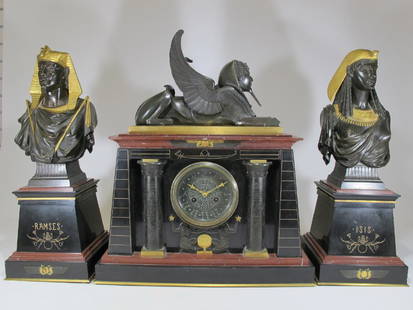 19th C Marti Orientalist Andy Warhol collection clock: 19th C French Marti Orientalist Andy Warhol collection gilt bronze & marble clock set, representing Isis & Ramses. Bought on Christies. Clock: 21 in H x 18 in W x 8 in D. Figures: 19 7/8 in H x 7 1/2