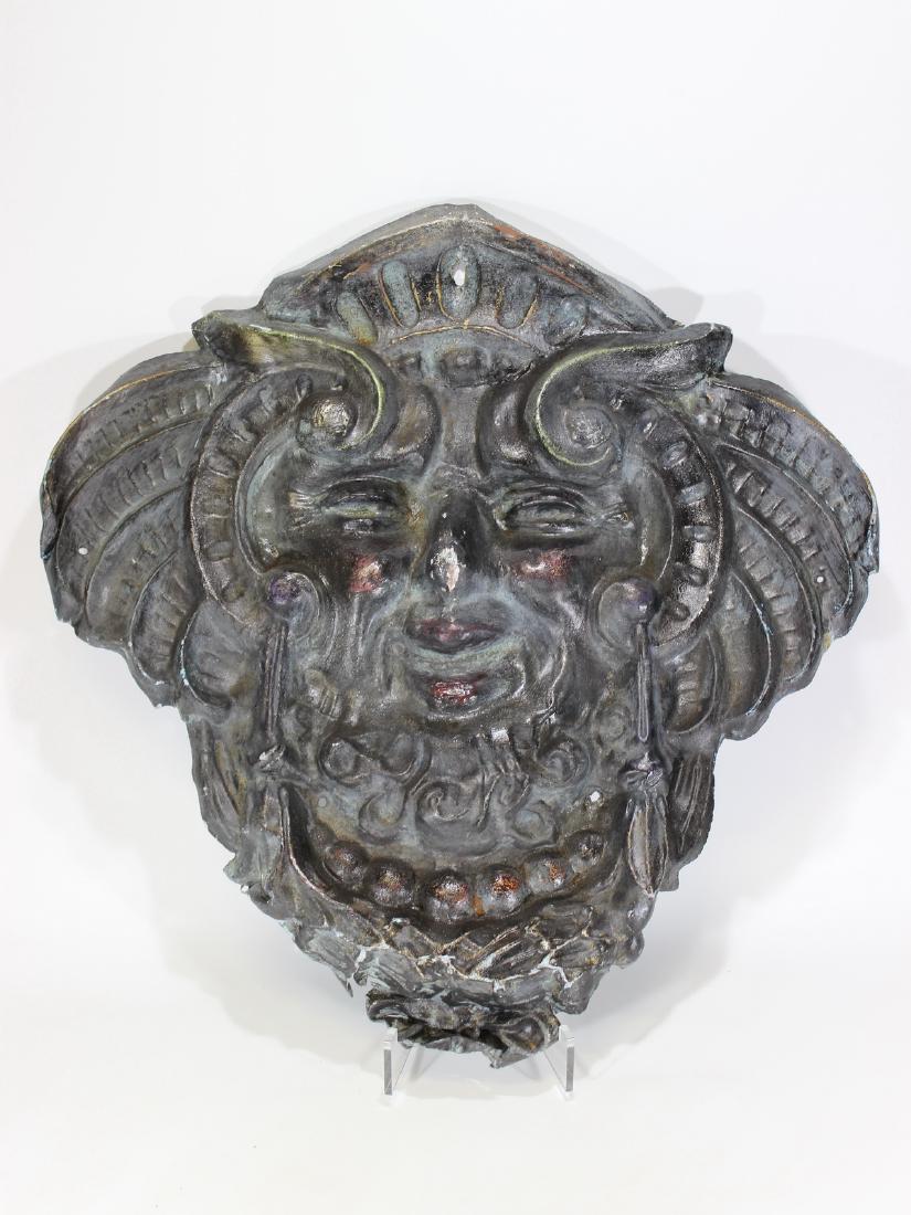 Antique face tin ornament (1 of 6)