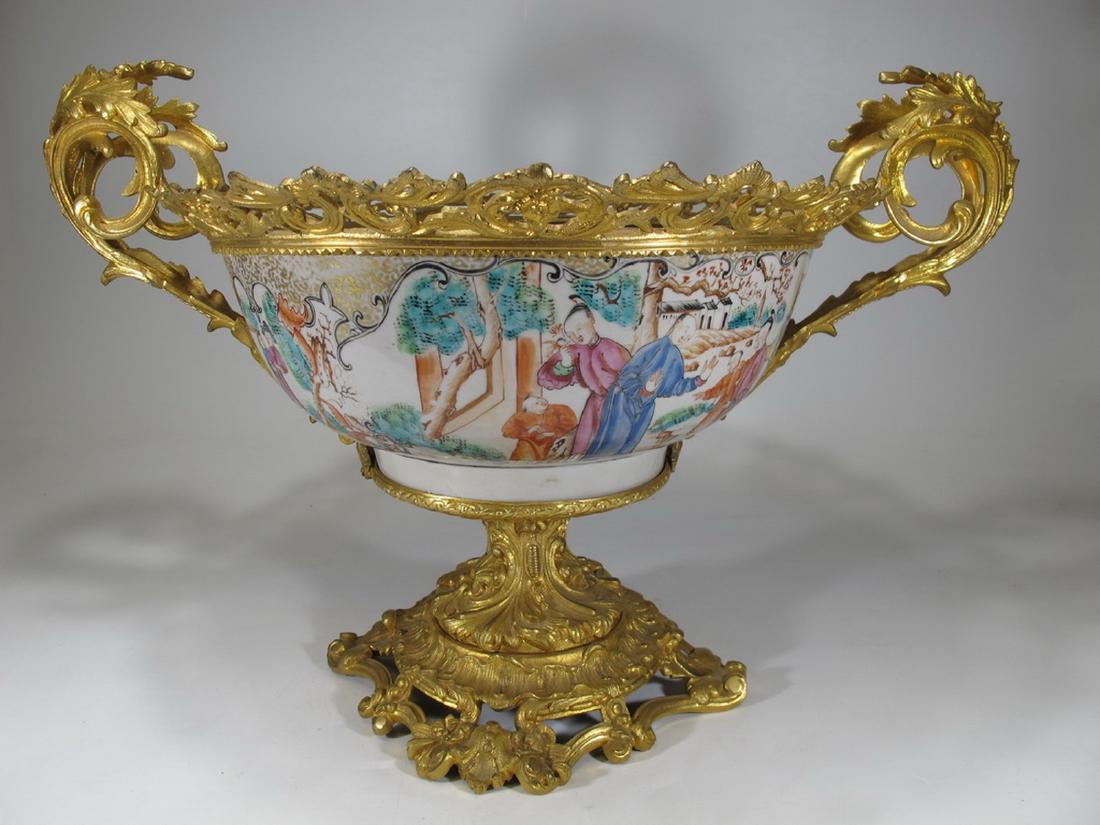 Antique Chinese porcelain & ormolu centerpiece: Antique Chinese porcelain & ormolu centerpiece. 13 in H x 18 3/4 in W x 13 1/2 in D. Shipping in USA or International please contact for quote: James Lawrence UPS Store 4356 - 954-463-0444 FloridaUPS@