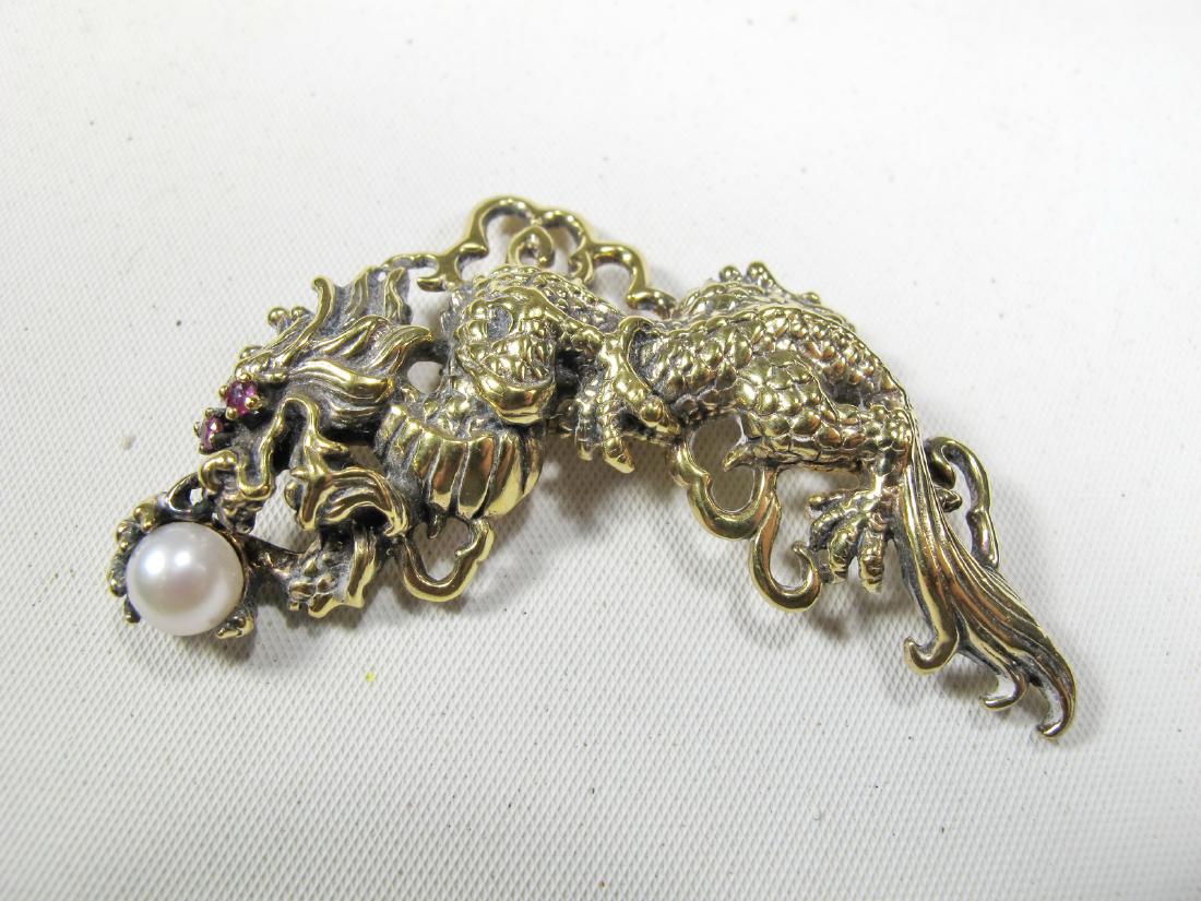 Vintage sterling 925, rubies & pearl broche: Vintage sterling 925, rubies & pearl broche. 1 3/8 in h x 2 1/4 in W. Weight: 15.5 grams (0t oz 9.966732 dwt). Shipping in USA or International please contact for quote both UPS stores: 1) : James Law
