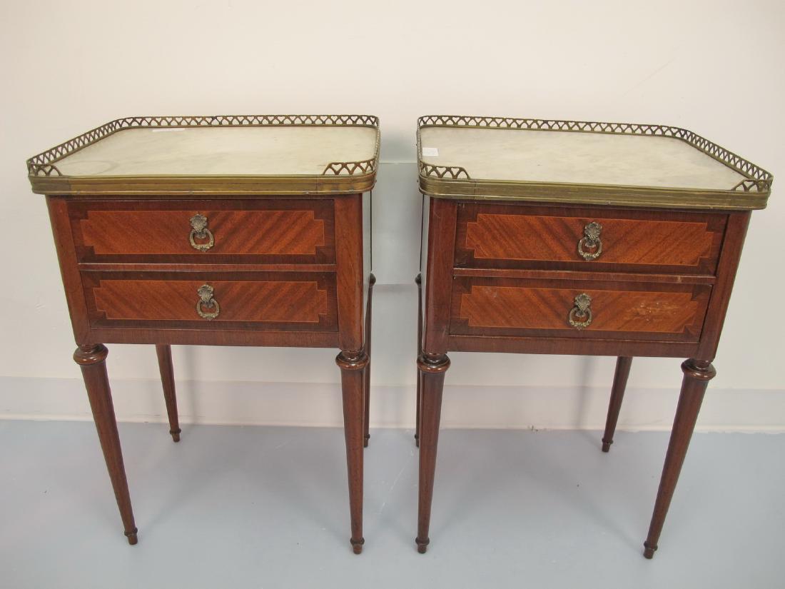 Vintage pair of French Louis XVI style marble top side: Vintage pair of French Louis XVI style marble top side tables with bronze handles & details. 24 1/4 in H x 16 3/8 in W x 12 7/8 in D. Shipping in USA or International please contact for quote both UPS