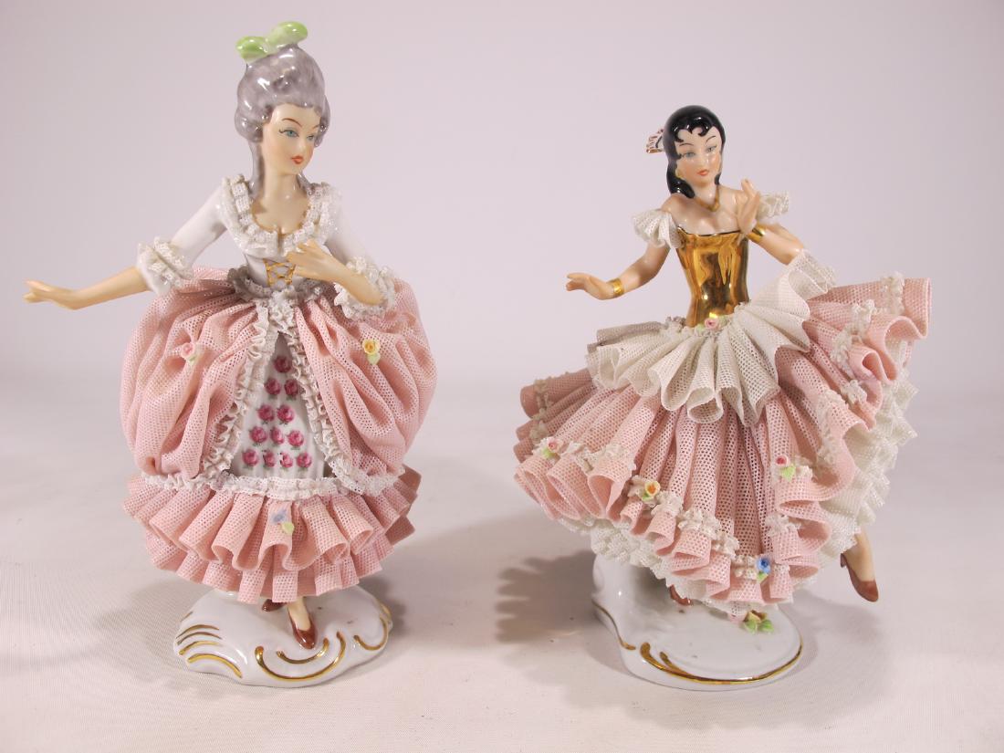 Sandizell West Germany 2 porcelain statues: Sandizell West Germany 2 porcelain statues. 7 1/4 in H x 5 in W x 5 in D and 4 5/8 in H x 4 3/4 in W x 3 3/8 in D. Shipping in USA or International please contact for quote both UPS stores: 1) : James