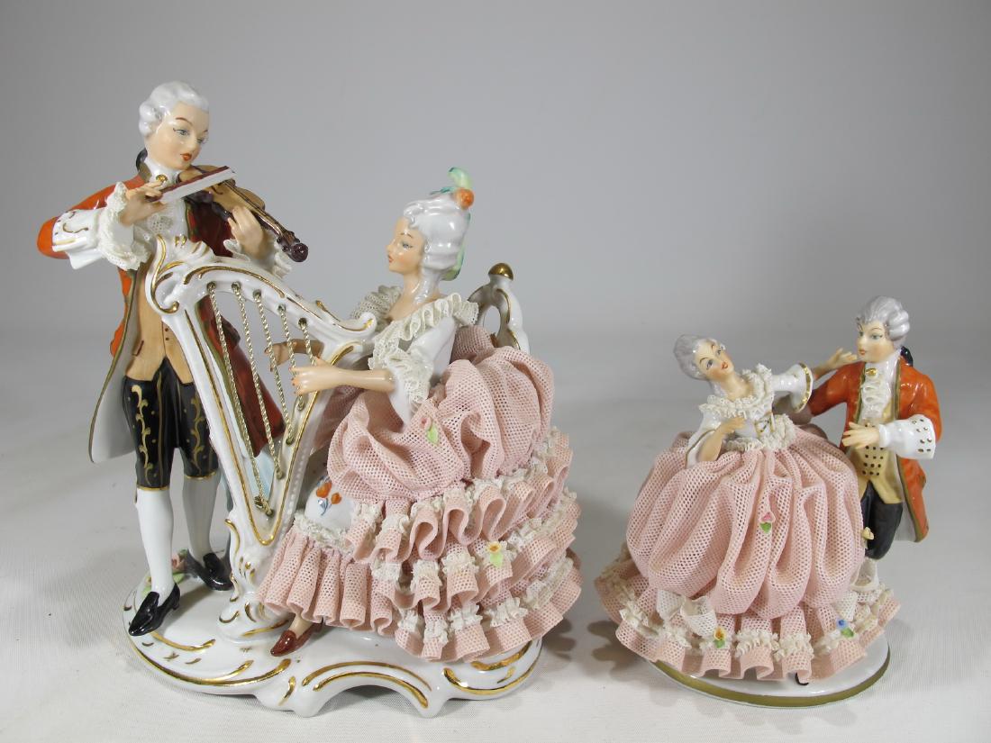 Sandizell West Germany 2 porcelain statues: Sandizell West Germany 2 porcelain statues. 7 1/2 in H x 6 1/4 in W x 4 in D and 4 3/4 in H x 4 1/4 in W x 3 5/8 in D. Shipping in USA or International please contact for quote both UPS stores: 1) : J