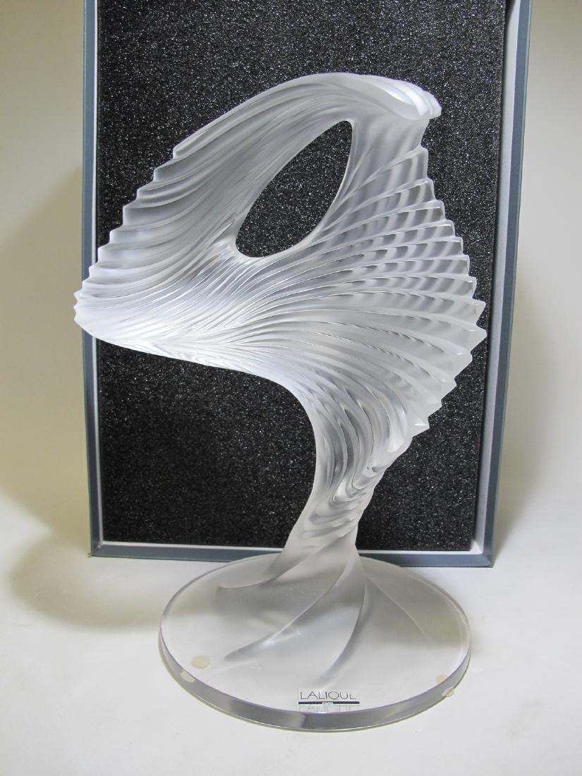 Lalique Trophy crystal frosted sculpture: Lalique Trophy crystal molded sculpture with the original box. 13 in H x 9 3/4 in W x 7 3/8 in D. Box: 9 3/8 in H x 17 5/8 in W x 12 1/4 in D. Shipping in USA or International please contact for quote