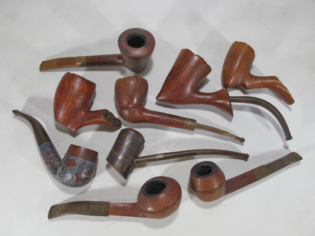 Vintage set of 8 Danish, French & English wood pipes: Vintage set of 8 Danish, French & English wood pipes. Soren, Denmark - Villager Algerian, France - Celoius Fantasy, Denmark - Charatanâ€™s, London, Claude Old Briar, France - Jimmy Ropp, France a