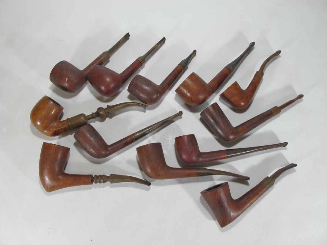 Vintage set of 8 Danish, French & English wood pipes: Vintage set of 8 Danish, French & English wood pipes. Bari Senior Old Briar, Denmark - Fireside, Denmark - Charatanâ€™s, London - Comeyâ€™s, London - Jobey Virgin Prima, Denmark - Claude Old