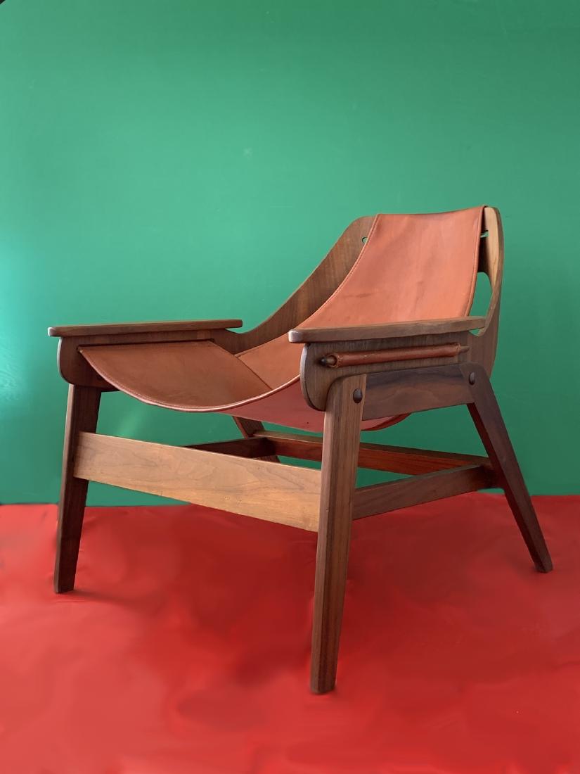 Mid Century Scandinavian wood & leather armchair: Mid Century Scandinavian wood & leather armchair. 28 1/8” H x 29 1/4” W x 30 1/2” D. Shipping in USA or International please contact for quote both UPS stores: 1) : James Lawrence UP