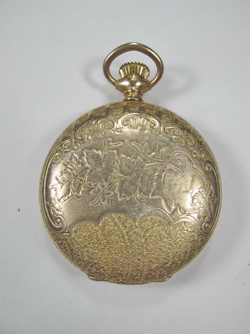 Elgin probably 14k gold case pocket watch: Elgin probably 14k gold case pocket watch. 1 1/2 in diameter. Total weight: 59 grams. Shipping in USA or International please contact for quote both UPS stores: 1) : James Lawrence UPS Store 4356 - 95