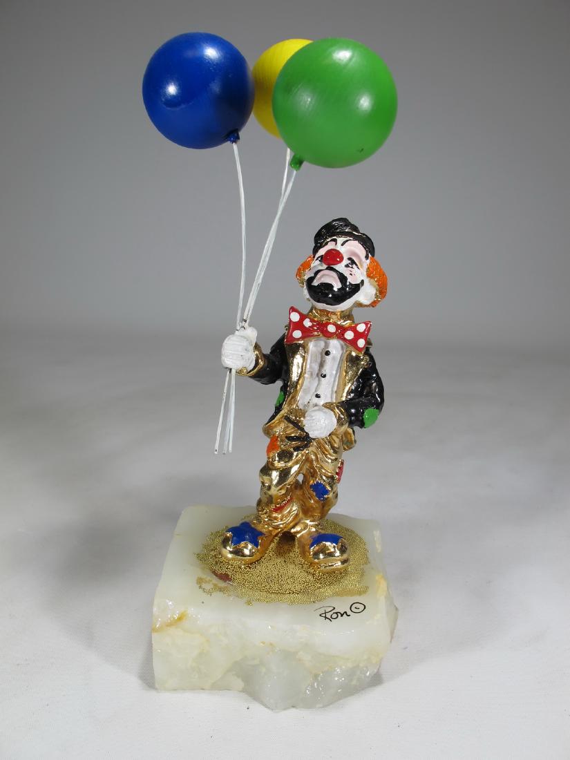 Ron LEE hand painted clown sculpture on an onyx base: Ron LEE hand painted clown sculpture on an onyx base. 9 1/4 in h x 3 3/4 in W x 3 1/4 in D. Shipping in USA or International please contact for quote both UPS stores: 1) : David Reiser UPS store 1937