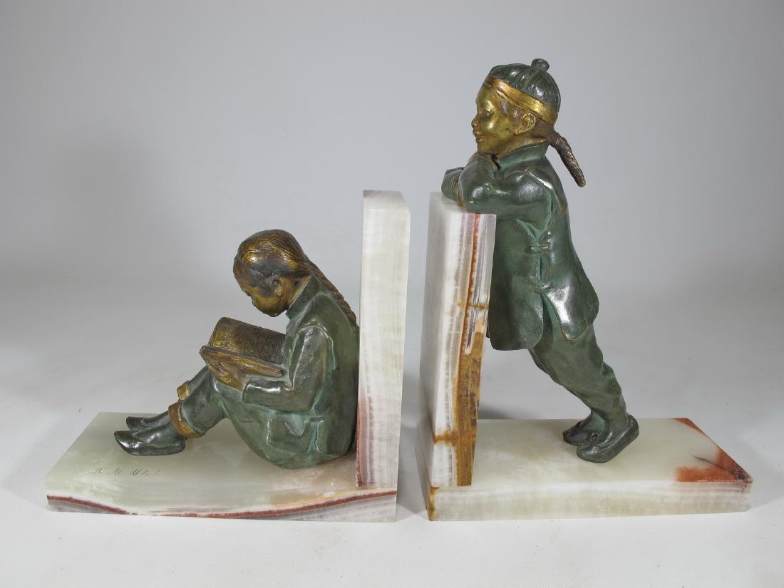 Hester Mabel WHITE (act.c.1898-1948) Chinese kids: Hester Mabel WHITE (act.c.1898-1948) Chinese kids bronze & onyx bookends, signed, signed. 8 5/8 in H x 6 1/2 in W x 2 3/4 in D and 5 7/8 in H x 6 1/2 in W x 2 3/4 in D. Shipping in USA or Internationa
