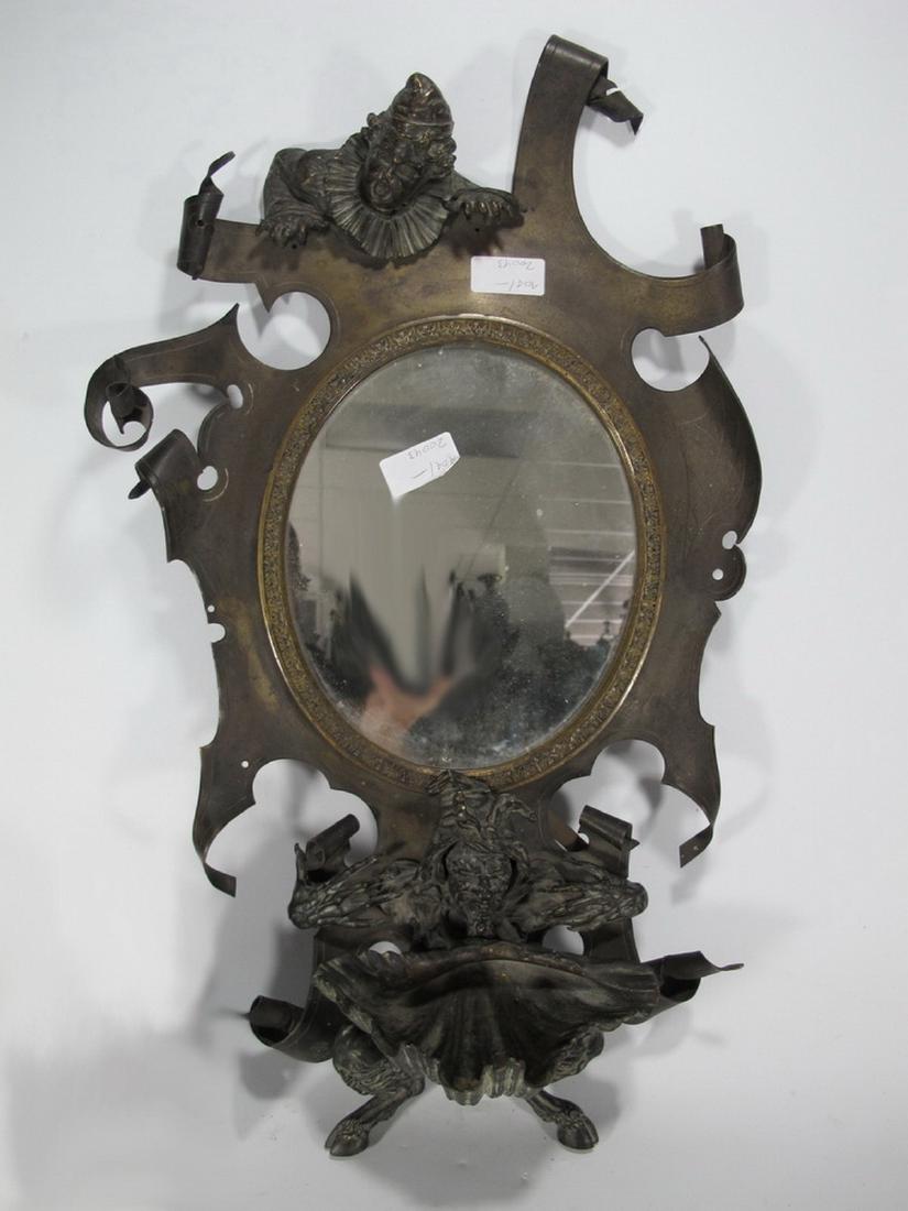 Antique probably Austrian bronze mirror: Antique probably Austrian bronze mirror with an Arlekin on top and a Satyr on the base. 21 7/8 in H x 12 3/4 in W x 5 5/8 in D. Shipping in USA or International please contact for quote both UPS store