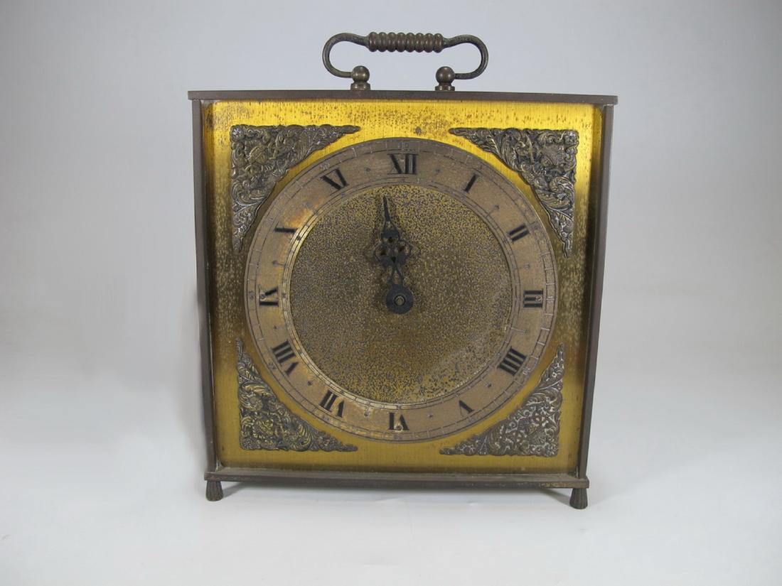 Antique European bronze travel clock: Antique European bronze travel clock. 8 1/4 in H x 7 3/4 in W x 2 1/8 in D. Shipping in USA or International please contact for quote both UPS stores: 1) : David Reiser UPS store 1937 - 954-454-1131 a