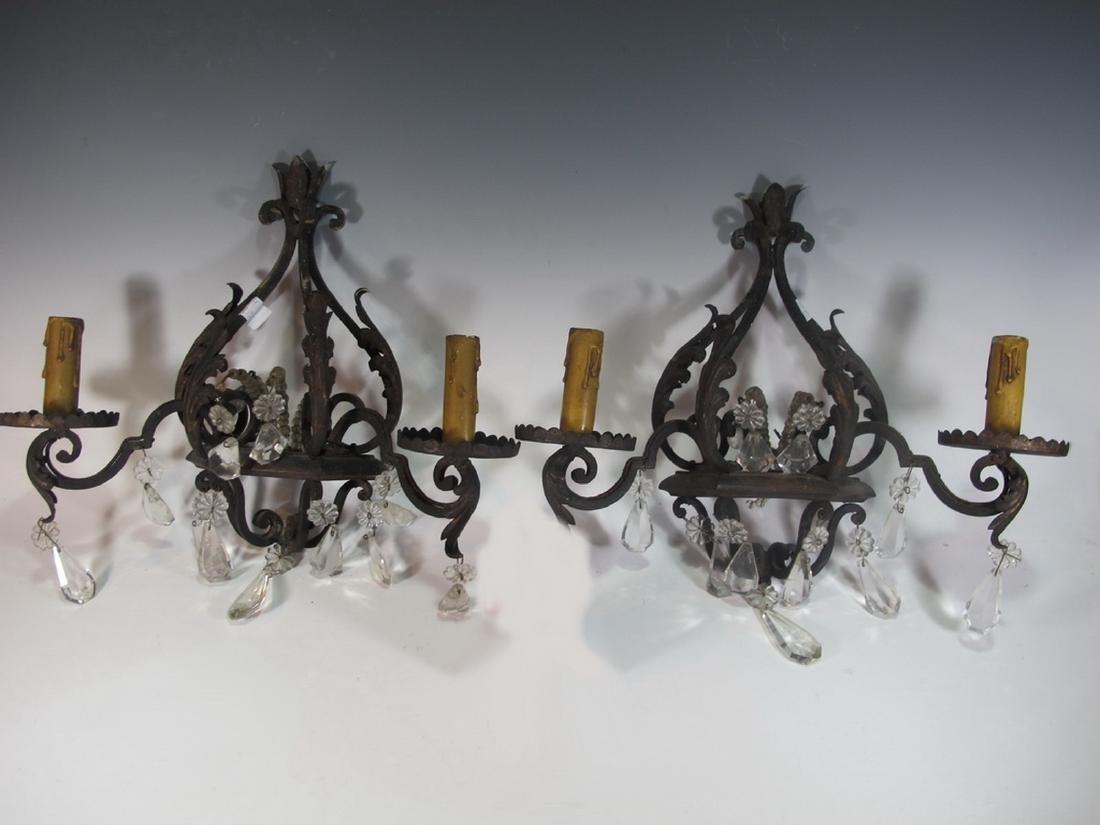 Antique pair of hollow wrought iron & crystals sconces: Antique pair of hollow wrought iron & crystals sconces. 16 in H x 15 3/4 in W including pendants. Shipping in USA or International please contact for quote both UPS stores: 1) : David Reiser UPS store