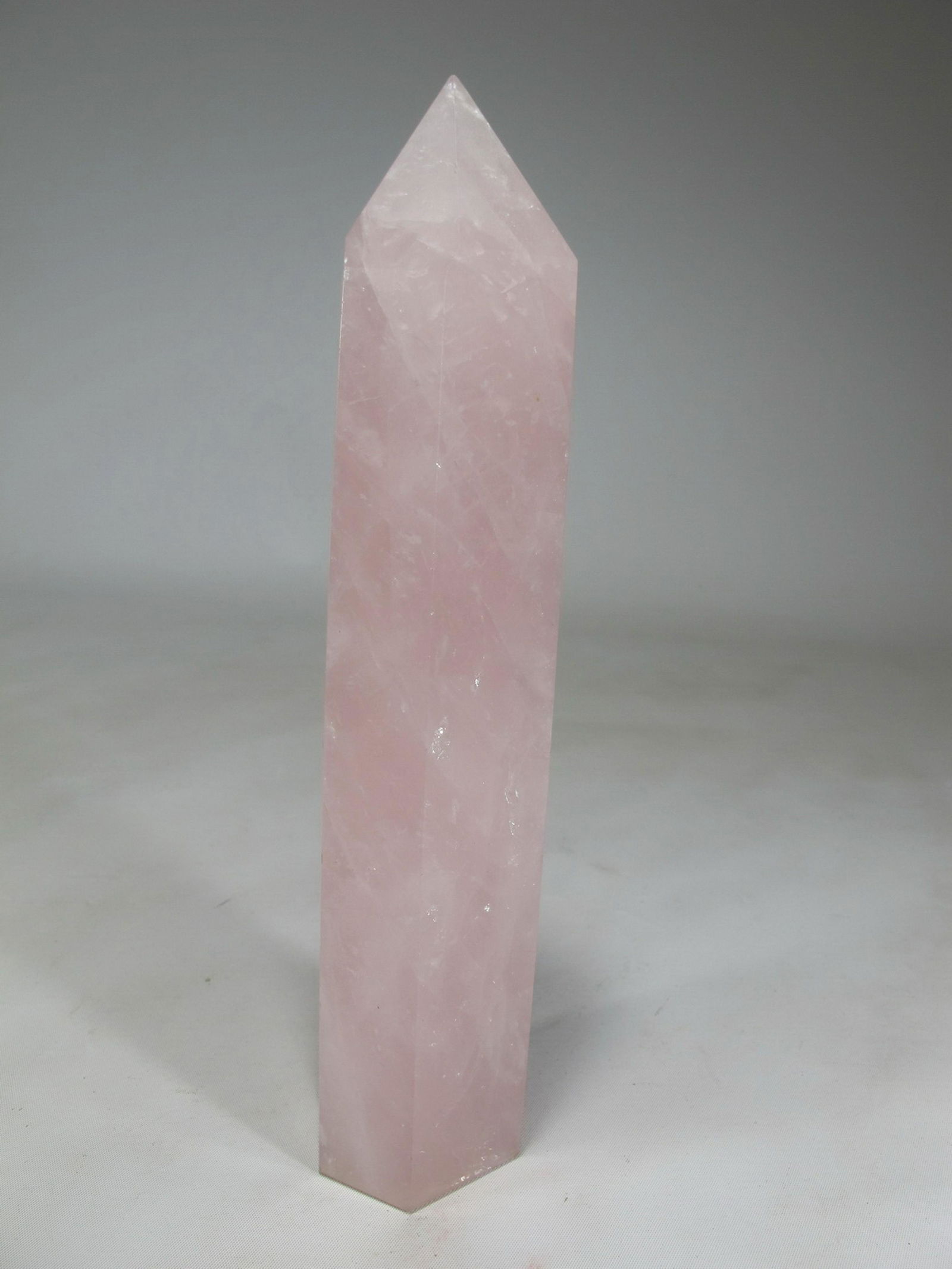 Great pink quartz obelisk: Great pink quartz obelisk. 9” H x 2” W. Shipping in USA or International please contact for quote both UPS stores: 1) : David Reiser UPS store 1937 - 954-454-1131 auctions1937@gmail.com or