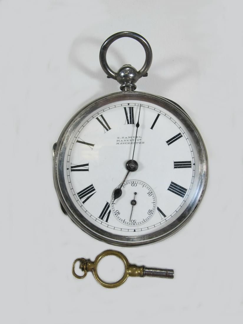 H. Samuel, St Market, Manchester, England silver pocket: H. Samuel, St Market, Manchester, England silver pocket watch. 2” diameter. Shipping in USA or International please contact for quote both UPS stores: 1) : David Reiser UPS store 1937 - 954-454-