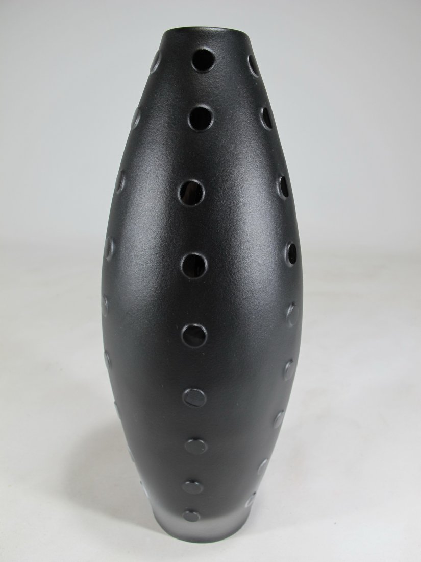 Orrefors, Sweden black amethyst glass vase: Orrefors, Sweden black amethyst glass vase. 8 3/4” H x 3 1/4” W. Shipping in USA or International please contact for quote both UPS stores: 1) : David Reiser UPS store 1937 - 954-454-1131 auctions